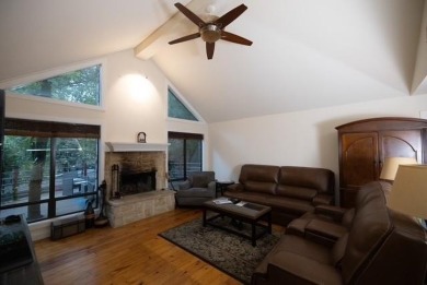 Welcome to this charming home nestled within the private, gated on Holly Lake Ranch Golf Club in Texas - for sale on GolfHomes.com, golf home, golf lot