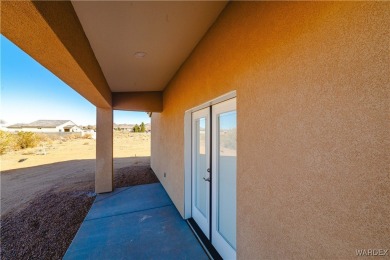 Nestled within the serene landscape of a golf course subdivision on Valle Vista Golf Course in Arizona - for sale on GolfHomes.com, golf home, golf lot