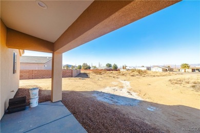 Nestled within the serene landscape of a golf course subdivision on Valle Vista Golf Course in Arizona - for sale on GolfHomes.com, golf home, golf lot