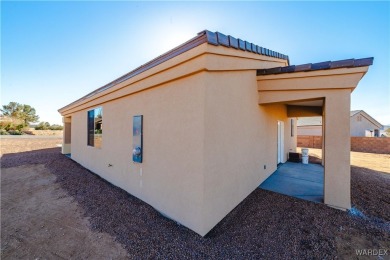 Nestled within the serene landscape of a golf course subdivision on Valle Vista Golf Course in Arizona - for sale on GolfHomes.com, golf home, golf lot