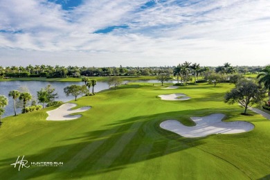 Wake up to breathtaking sunrises in this beautifully updated on Hunters Run Golf and Country Club in Florida - for sale on GolfHomes.com, golf home, golf lot