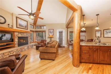Rare 4-bedroom end unit townhome with warm wood accents and a on The River Course At Keystone in Colorado - for sale on GolfHomes.com, golf home, golf lot