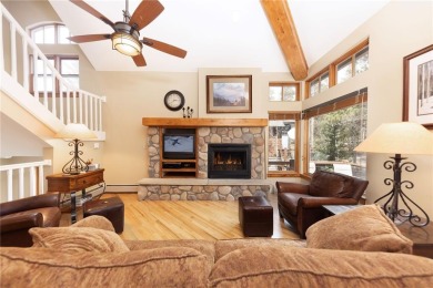 Rare 4-bedroom end unit townhome with warm wood accents and a on The River Course At Keystone in Colorado - for sale on GolfHomes.com, golf home, golf lot