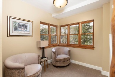 Rare 4-bedroom end unit townhome with warm wood accents and a on The River Course At Keystone in Colorado - for sale on GolfHomes.com, golf home, golf lot
