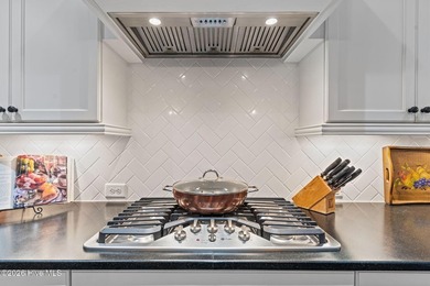 Located on a private lot backing to a serene, wooded preserve on Cape Fear National At Brunswick Forest in North Carolina - for sale on GolfHomes.com, golf home, golf lot