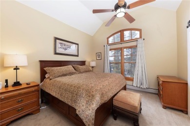 Rare 4-bedroom end unit townhome with warm wood accents and a on The River Course At Keystone in Colorado - for sale on GolfHomes.com, golf home, golf lot