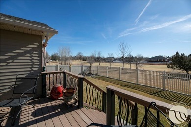 Beautifully maintained 5-bedroom, 3-bath home backing to Lake on Lake Hills Golf Course in Montana - for sale on GolfHomes.com, golf home, golf lot