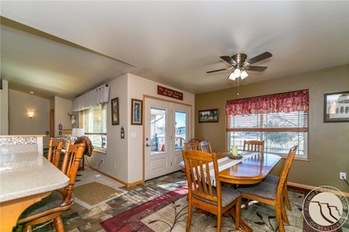 Beautifully maintained 5-bedroom, 3-bath home backing to Lake on Lake Hills Golf Course in Montana - for sale on GolfHomes.com, golf home, golf lot