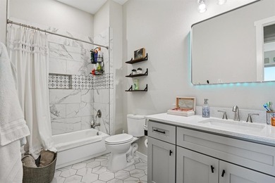 LUXURY MODERN FARMHOUSE WITH RIVER VIEWS & WALK OUT BASEMENT IN on Pecan Plantation Country Club in Texas - for sale on GolfHomes.com, golf home, golf lot