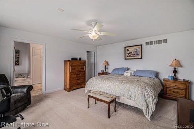 Welcome to 1171 North Shore, an exceptional waterfront property on Duck Lake Country Club in Michigan - for sale on GolfHomes.com, golf home, golf lot