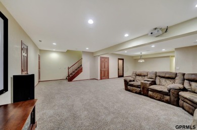 This custom Manzitto home is a jewel of the Pine Lake community! on Pine Lake Golf and Tennis Club in Nebraska - for sale on GolfHomes.com, golf home, golf lot