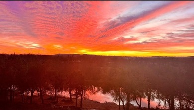 LUXURY MODERN FARMHOUSE WITH RIVER VIEWS & WALK OUT BASEMENT IN on Pecan Plantation Country Club in Texas - for sale on GolfHomes.com, golf home, golf lot