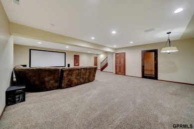 This custom Manzitto home is a jewel of the Pine Lake community! on Pine Lake Golf and Tennis Club in Nebraska - for sale on GolfHomes.com, golf home, golf lot