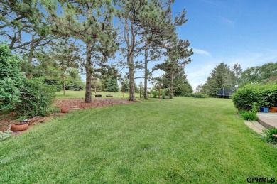 This custom Manzitto home is a jewel of the Pine Lake community! on Pine Lake Golf and Tennis Club in Nebraska - for sale on GolfHomes.com, golf home, golf lot