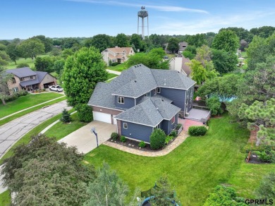 This custom Manzitto home is a jewel of the Pine Lake community! on Pine Lake Golf and Tennis Club in Nebraska - for sale on GolfHomes.com, golf home, golf lot