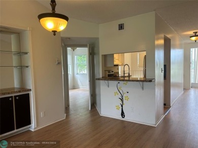 Stunning 2 Bedroom, 2 Bath Corner Unit in Breezes at Palm Aire! on Palm-Aire Country Club and Resort - Palms in Florida - for sale on GolfHomes.com, golf home, golf lot