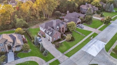 Welcome to this stunning colonial brick home in the highly on The Orchards Golf Club in Michigan - for sale on GolfHomes.com, golf home, golf lot