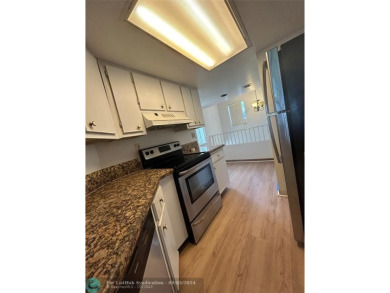 Stunning 2 Bedroom, 2 Bath Corner Unit in Breezes at Palm Aire! on Palm-Aire Country Club and Resort - Palms in Florida - for sale on GolfHomes.com, golf home, golf lot