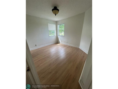 Stunning 2 Bedroom, 2 Bath Corner Unit in Breezes at Palm Aire! on Palm-Aire Country Club and Resort - Palms in Florida - for sale on GolfHomes.com, golf home, golf lot