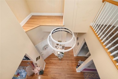 Spacious 3 bedroom 2.5 bath townhouse featuring a fireplaced on Midville Country Club in Rhode Island - for sale on GolfHomes.com, golf home, golf lot