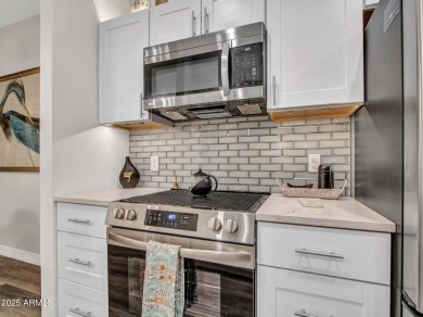 Discover effortless condo living at La Solana in The Grand, a on Sun City Grand Golf Couse and Club in Arizona - for sale on GolfHomes.com, golf home, golf lot