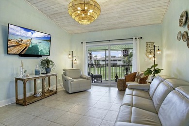 Gorgeous 2 bed, 2 bath, 2nd floor condo overlooking the 8th on Ocean Village Golf Course in Florida - for sale on GolfHomes.com, golf home, golf lot