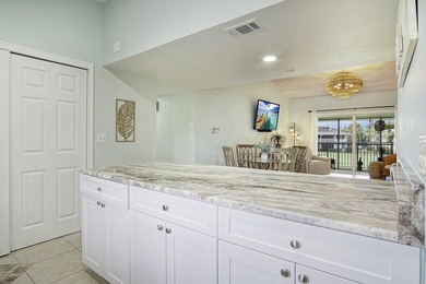 Gorgeous 2 bed, 2 bath, 2nd floor condo overlooking the 8th on Ocean Village Golf Course in Florida - for sale on GolfHomes.com, golf home, golf lot