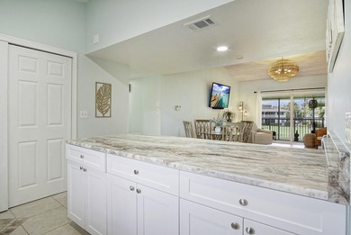 Gorgeous 2 bed, 2 bath, 2nd floor condo overlooking the 8th on Ocean Village Golf Course in Florida - for sale on GolfHomes.com, golf home, golf lot