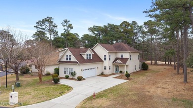 Welcome to this stunning 3,115-square-foot home perfectly on North Shore Country Club in North Carolina - for sale on GolfHomes.com, golf home, golf lot