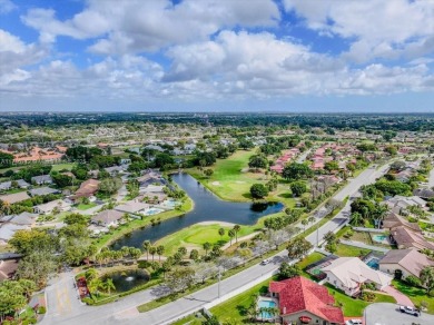 Welcome to Les Jardins, nestled within the prestigious Woodmont on Woodmont Country Club in Florida - for sale on GolfHomes.com, golf home, golf lot