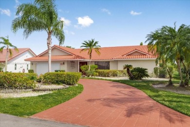 Welcome to Les Jardins, nestled within the prestigious Woodmont on Woodmont Country Club in Florida - for sale on GolfHomes.com, golf home, golf lot