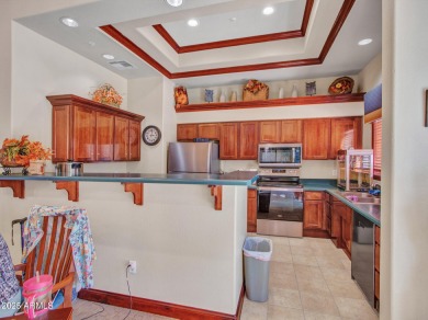 Discover effortless condo living at La Solana in The Grand, a on Sun City Grand Golf Couse and Club in Arizona - for sale on GolfHomes.com, golf home, golf lot