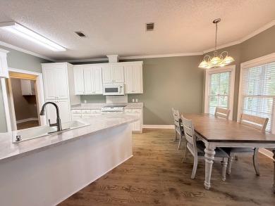This 3 bed, 2.5 bath home feels spacious with tall 12' ceilings on Stone Creek Golf Club in Georgia - for sale on GolfHomes.com, golf home, golf lot
