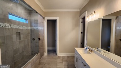 Welcome home to this beautifully refreshed 5-bedroom Craftsman on Traditions of Braselton Golf Club in Georgia - for sale on GolfHomes.com, golf home, golf lot