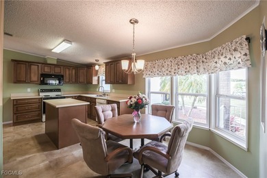 OWNED LAND- NO LEASEE INVOLVED Beautiful 2 Bedroom, 2 Bath home on Pine Lakes Country Club in Florida - for sale on GolfHomes.com, golf home, golf lot