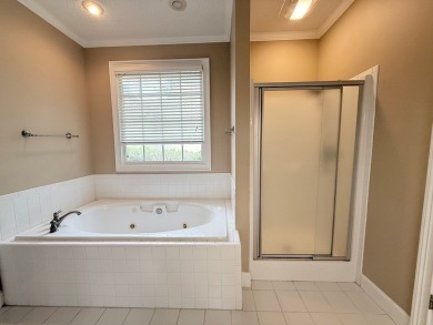 This 3 bed, 2.5 bath home feels spacious with tall 12' ceilings on Stone Creek Golf Club in Georgia - for sale on GolfHomes.com, golf home, golf lot