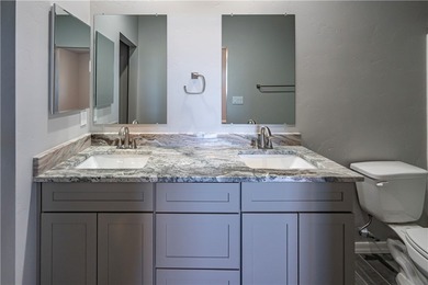 Nestled within the serene landscape of a golf course subdivision on Valle Vista Golf Course in Arizona - for sale on GolfHomes.com, golf home, golf lot