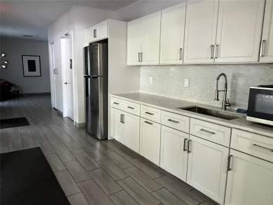 COME FOR THE VIEWS, STAY FOR THE LIFESTYLE! This spacious 3-bed on Oaks Country Club in Florida - for sale on GolfHomes.com, golf home, golf lot