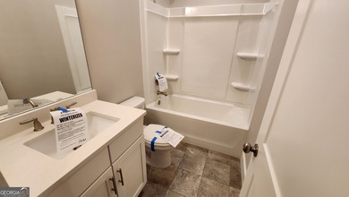 Welcome home to this beautifully refreshed 5-bedroom Craftsman on Traditions of Braselton Golf Club in Georgia - for sale on GolfHomes.com, golf home, golf lot