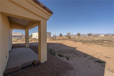 Nestled within the serene landscape of a golf course subdivision on Valle Vista Golf Course in Arizona - for sale on GolfHomes.com, golf home, golf lot