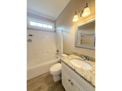 This 3 bed, 2.5 bath home feels spacious with tall 12' ceilings on Stone Creek Golf Club in Georgia - for sale on GolfHomes.com, golf home, golf lot