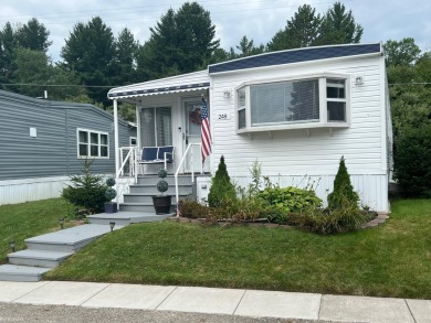 1970 Single Wide open concept, completely furnished home, sits on Huron Shores Golf Club in Michigan - for sale on GolfHomes.com, golf home, golf lot