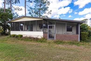 55+ COMMUNITY - Investor Alert: Diamond in the Rough!  Calling on Lake Fairways Country Club in Florida - for sale on GolfHomes.com, golf home, golf lot