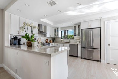 Welcome to this exquisitely renovated condo where refined on Gleneagles Golf and Country Club in Florida - for sale on GolfHomes.com, golf home, golf lot