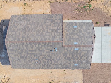 Nestled within the serene landscape of a golf course subdivision on Valle Vista Golf Course in Arizona - for sale on GolfHomes.com, golf home, golf lot