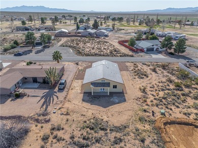 Nestled within the serene landscape of a golf course subdivision on Valle Vista Golf Course in Arizona - for sale on GolfHomes.com, golf home, golf lot