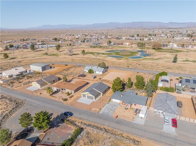 Nestled within the serene landscape of a golf course subdivision on Valle Vista Golf Course in Arizona - for sale on GolfHomes.com, golf home, golf lot