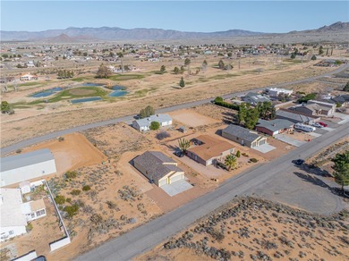 Nestled within the serene landscape of a golf course subdivision on Valle Vista Golf Course in Arizona - for sale on GolfHomes.com, golf home, golf lot