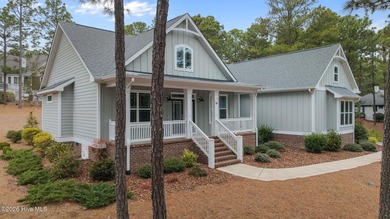 Beautifully crafted 2020 farmhouse-style home in gated Pinewild on Pinewild Country Club of Pinehurst in North Carolina - for sale on GolfHomes.com, golf home, golf lot