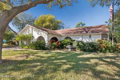 Please note: the home WILL NEED NEW ROOF, and the POOL PUMP IS on Oak Hills Country Club in Florida - for sale on GolfHomes.com, golf home, golf lot